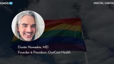 Dr. Dustin Nowaskie, OutCare Health_Rainbow flag waving in the wind by Alexander Spatari/Getty Images